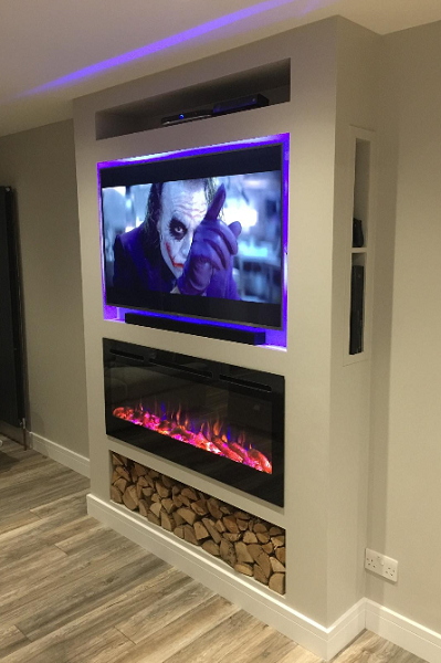 50 inch inset wall hung electric fire with TV above